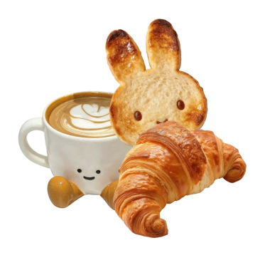 A croissant and a coffee cup